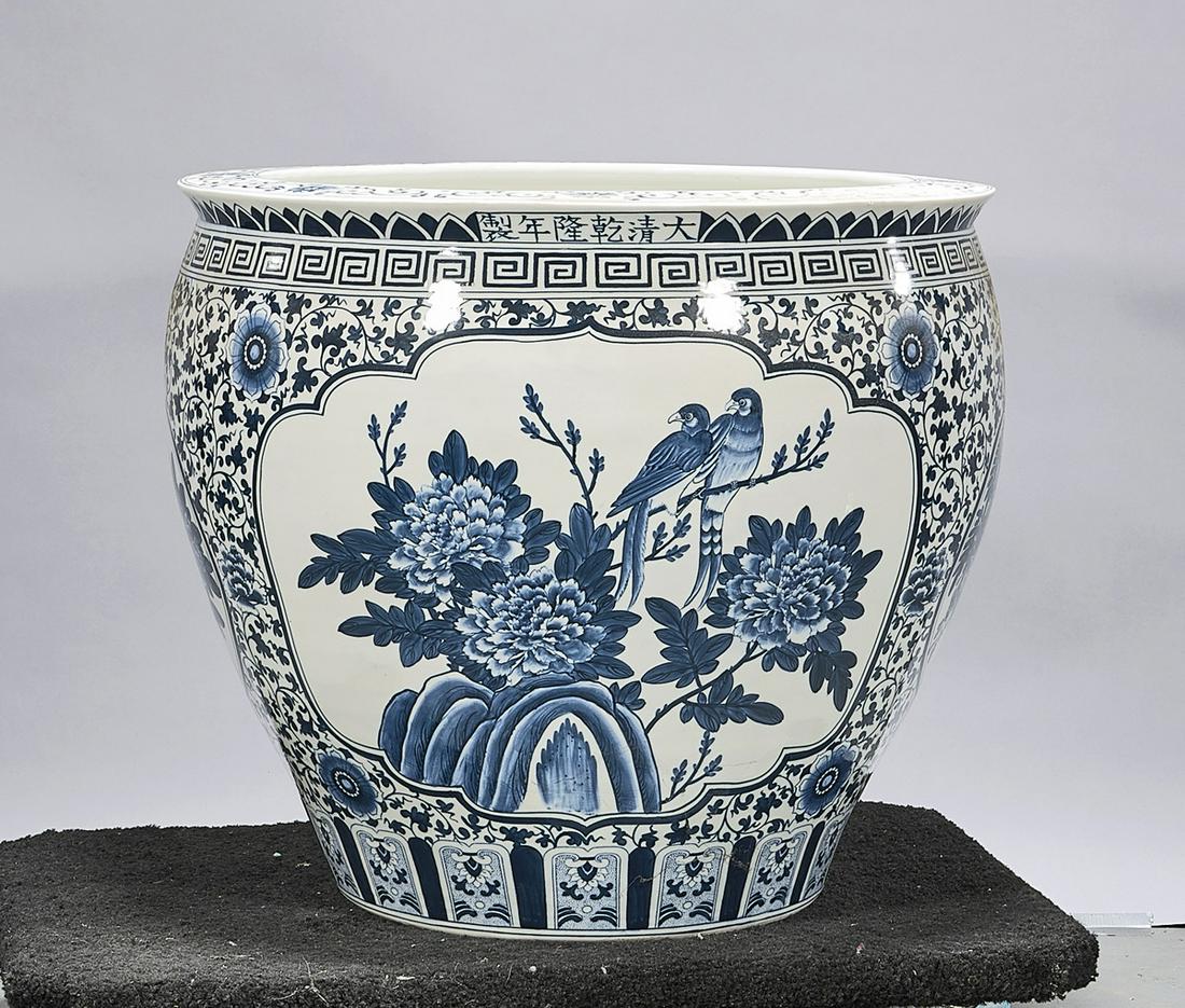 Large Chinese Blue and White Porcelain Fish Bowl: Large Chinese blue and white porcelain fish bowl; mark to neck; 21" x 25" (approx.) Condition: general wear, frits, pits, minor losses