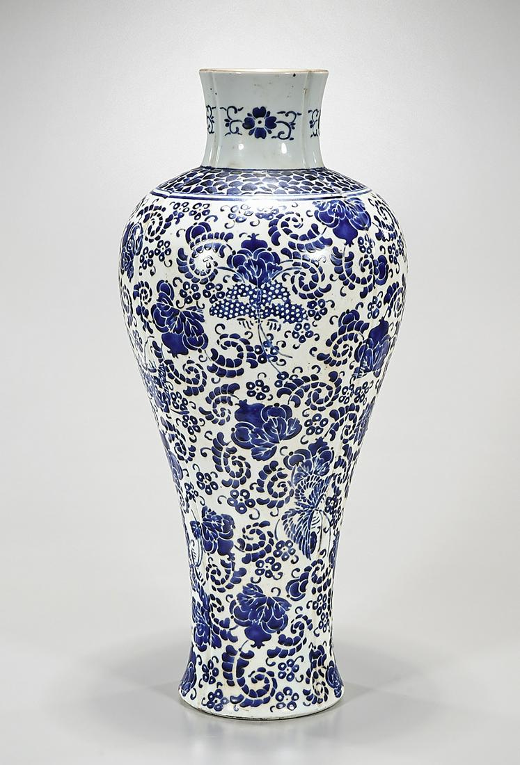Chinese Blue and White Porcelain Meiping Vase: Chinese blue and white porcelain meiping vase; floral design; mark to base; 20" x 9" (approx.) Condition: general wear, frits, pits, minor losses