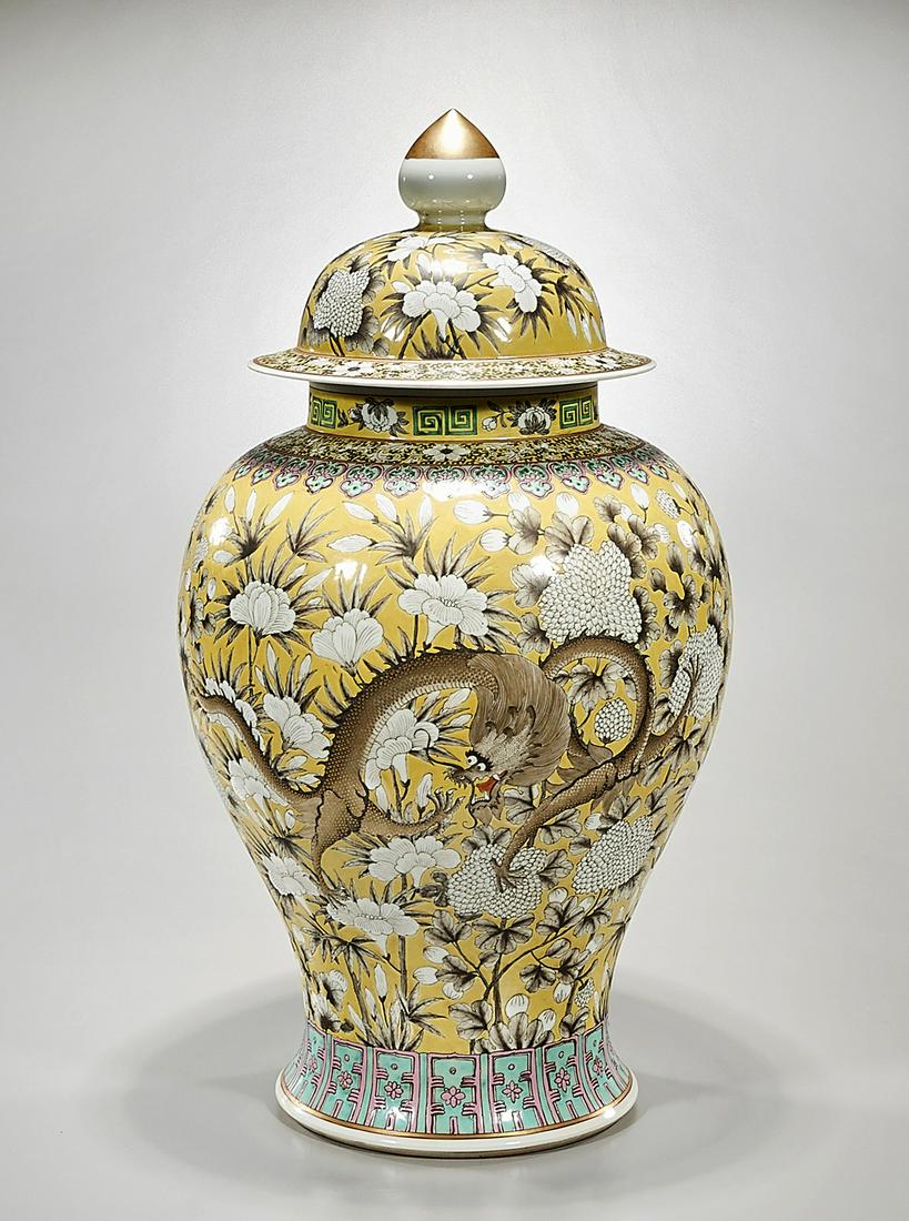 Tall Chinese Enameled Porcelain Covered Vase: Tall Chinese enameled porcelain covered vase; dragons and flowers motif; 25 1/2" x 14 1/2" (approx.) Condition: general wear, frits, pits, minor losses