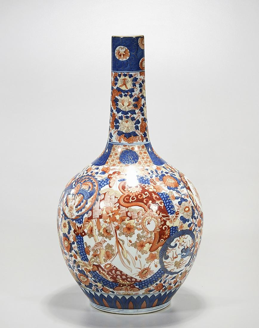 Japanese Blue, Red and White Porcelain Vase: Japanese blue, red and white porcelain bottle neck vase; mark to base; 17" x 9" (approx.) Condition: general wear, frits, pits, minor losses