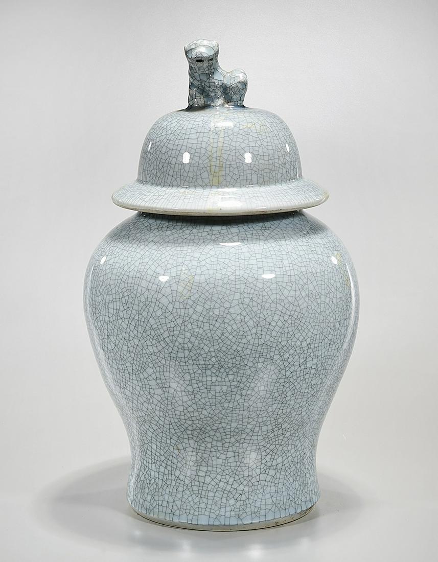 Chinese Crackle Glazed Porcelain Covered Vase: Chinese crackle glazed porcelain covered vase; animal form finial; 20" x 11 1/2" (approx.) Condition: general wear, frits, pits, minor losses