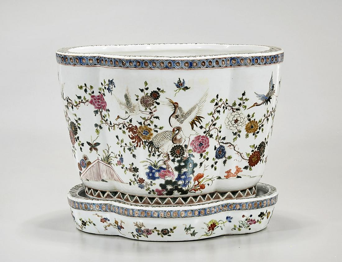 Chinese Enameled Porcelain Jardiniere: Chinese enameled porcelain quatrefoil jardiniere; with basin; floral and butterfly decoration; 9 1/2" x 12" x 10 3/4" (approx.) Condition: general wear, frits, pits, minor losses