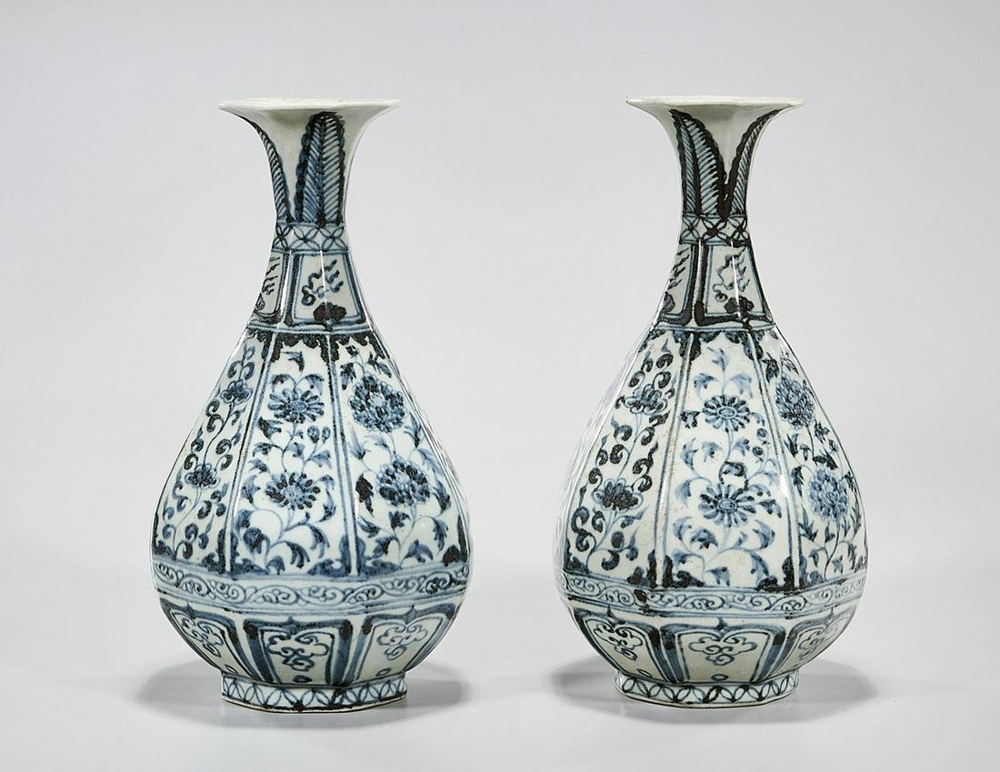 Pair Chinese Blue and White Porcelain Yuhuchunping: Pair of Chinese blue and white porcelain octagonal yuhuchunping vases; depicting scrolling flowers; 11" x 6" (approx.) Condition: wear, frits, pits, minor loss