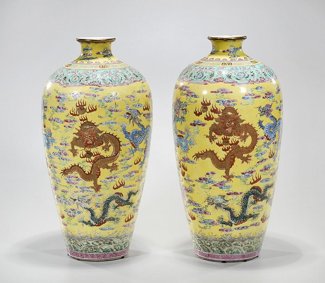 Pair Chinese Enameled Porcelain Vases: Pair of Chinese enameled porcelain meiping vases; dragons chasing pearls; yellow ground; 18" x 9" (approx.) Condition: wear, frits, pits, minor loss