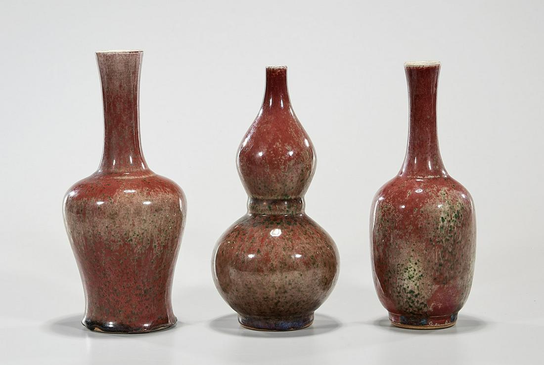 Group of Three Chinese Peach Bloom Vases: Three Chinese peach bloom vases; 9 1/2" x 4" (tallest, approx.) Condition: wear, frits, pits, minor loss