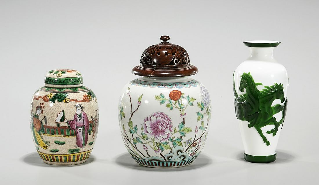 Three Various Chinese Vessels: Three various Chinese vessels; including two covered porcelain jars and one glass vase; 8" x 6" (largest, approx.) Condition: wear, frits, pits, surface scuffing