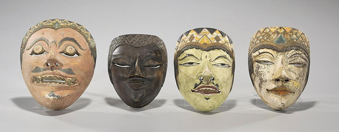 Group of Four Indonesian Wood Masks: Group of four Indonesian wood masks; three with polychrome; H: 8 1/2" (largest, approx.)
