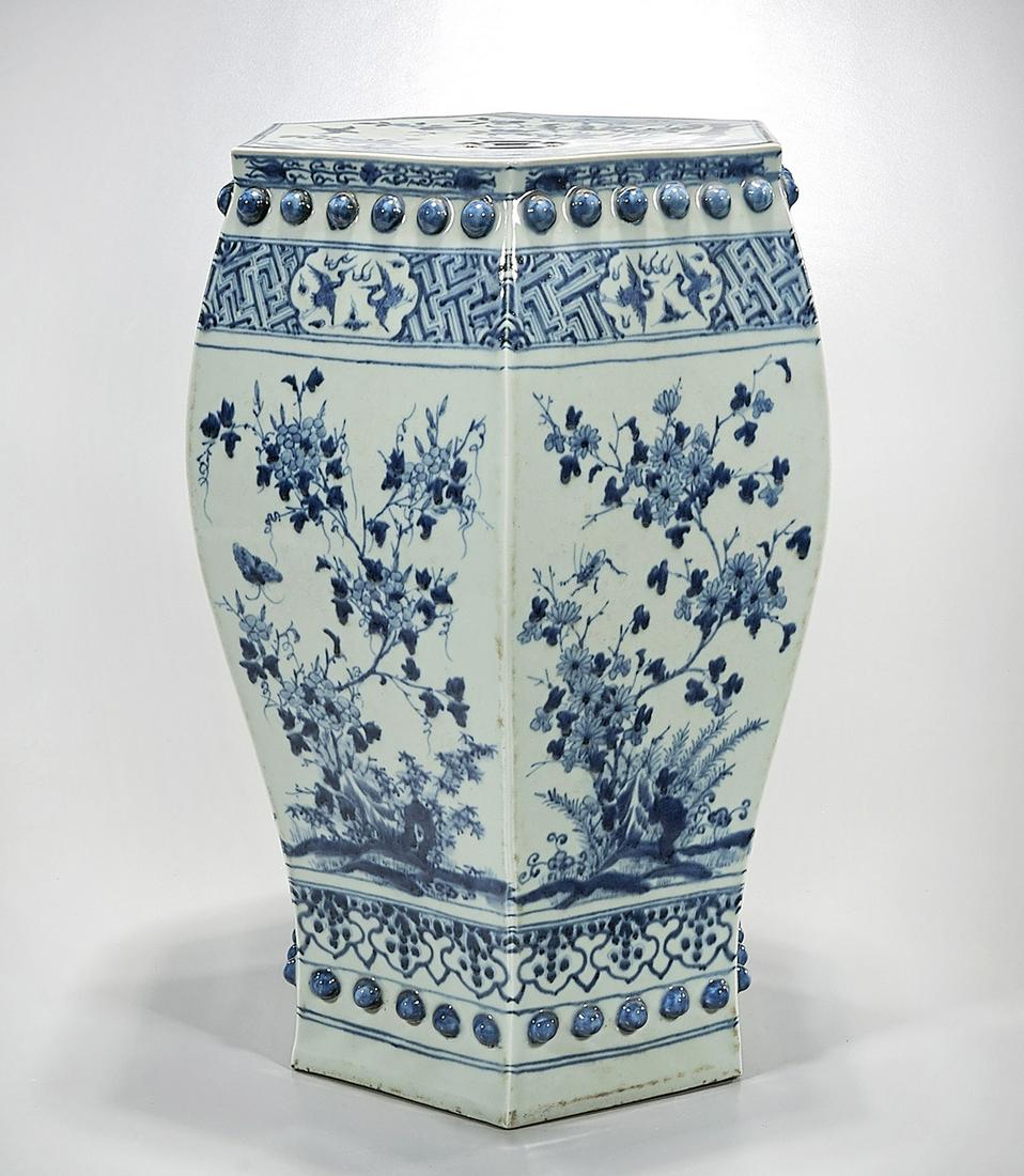 Chinese Blue and White Porcelain Hexagonal Garden Seat: Chinese blue and white porcelain hexagonal garden seat; with floral motif; 18 1/2" x 13 1/2" x 11" (approx.) Condition: wear, frits, pits, minor loss