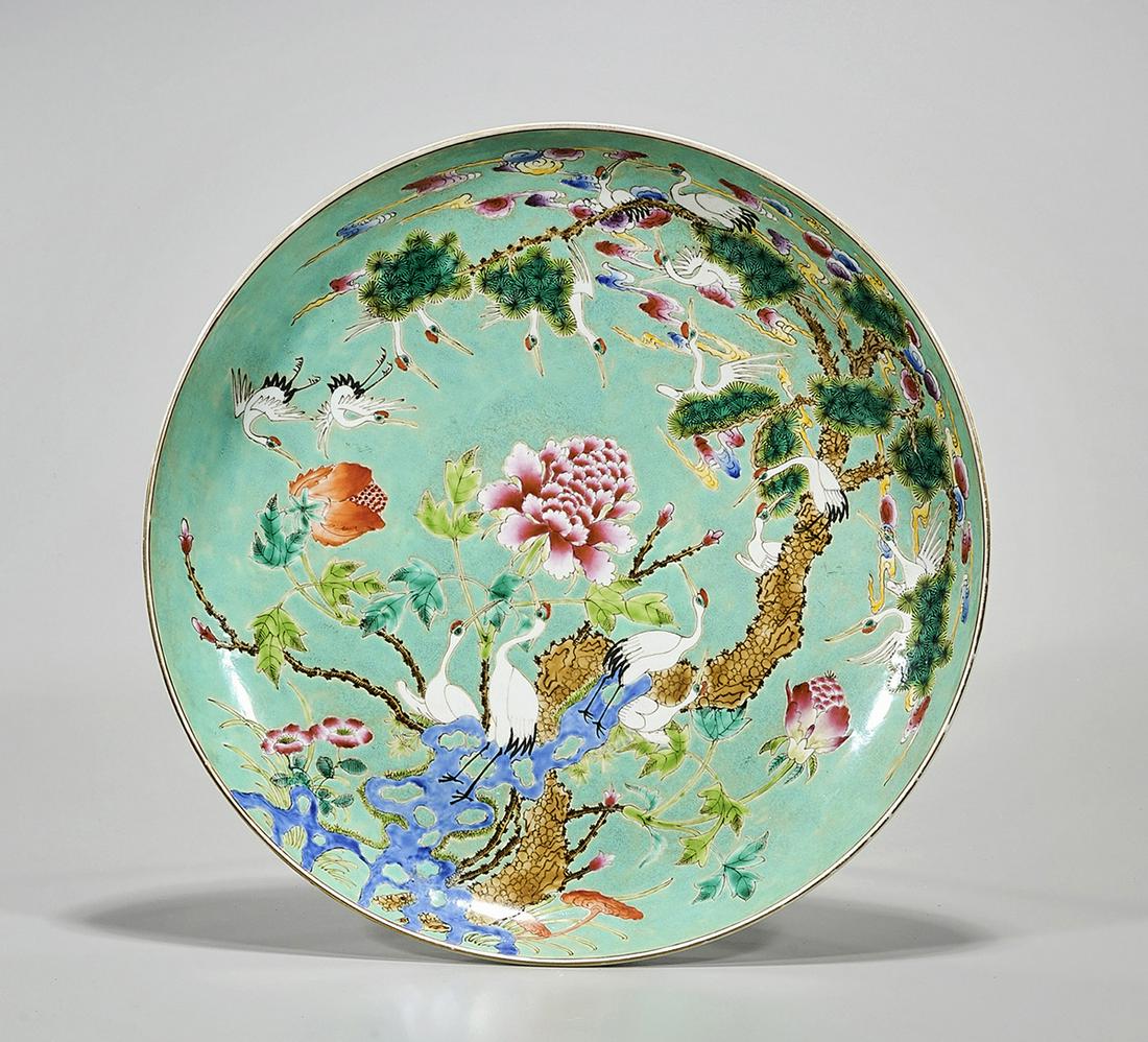 Chinese Enameled Porcelain Charger: Chinese enameled porcelain charger; famille rose; turquoise ground with birds and flowers design; Guangxu mark to base; D: 13 1/4" (approx.) Condition: wear, frits, pits, minor loss