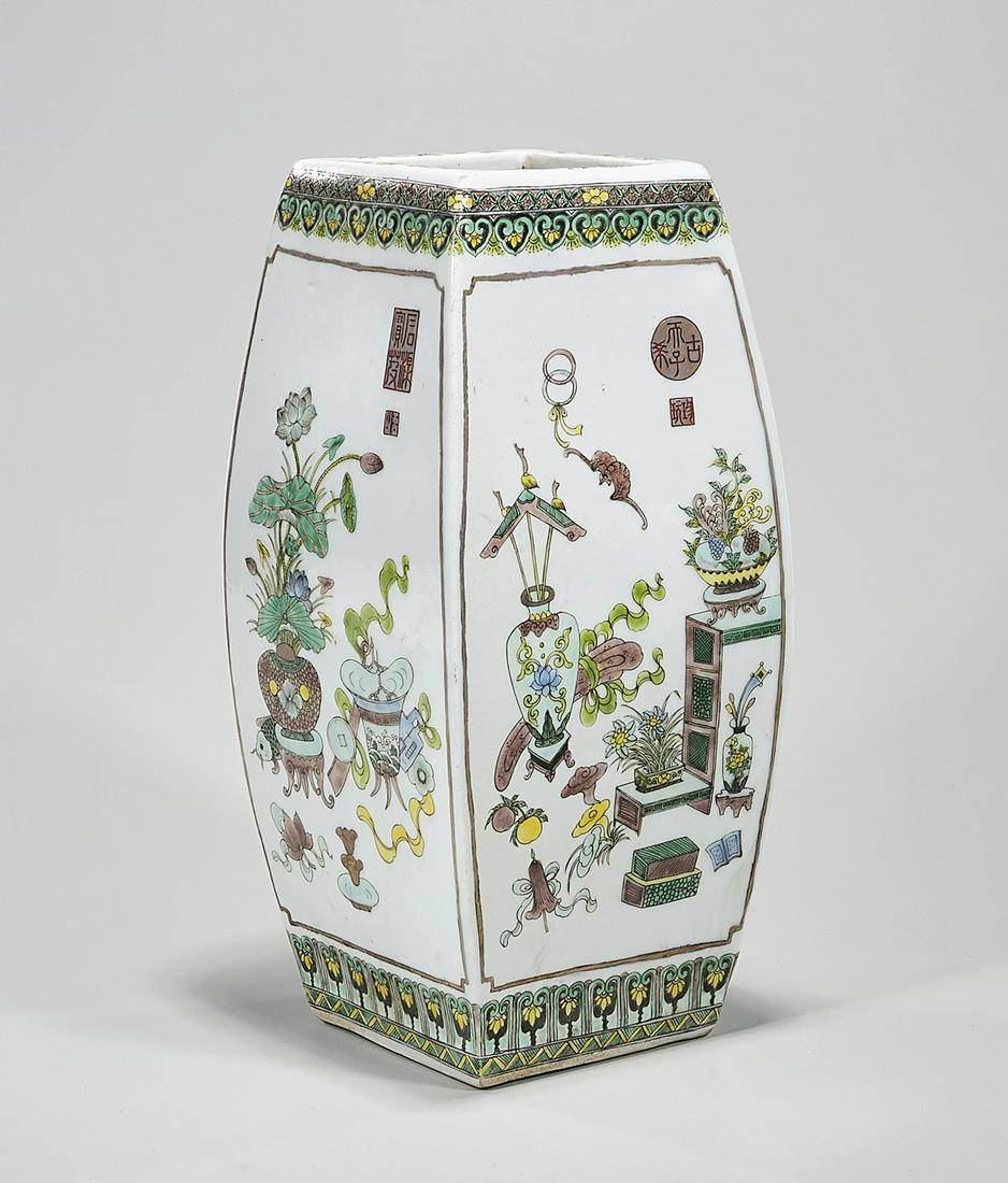 Chinese Enameled Porcelain Four-Faceted Vase: Chinese enameled porcelain four-faceted vase; with floral motifs; 13 1/2" x 6 1/2" (approx.) Condition: wear, frits, pits, minor loss
