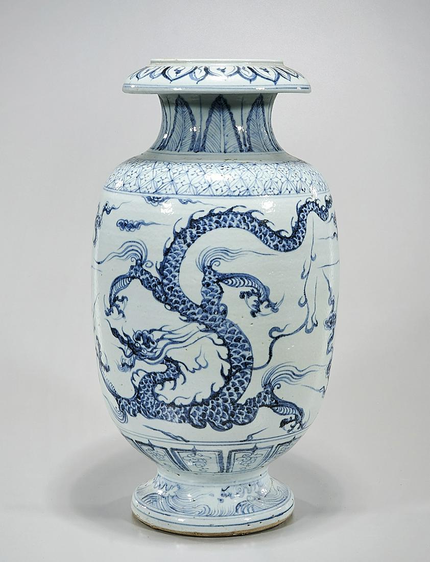 Chinese Blue and White Porcelain Vase: Chinese blue and white porcelain vase; dragons chasing pearls; 18" x 9" (approx.) Condition: wear, frits, pits, minor loss