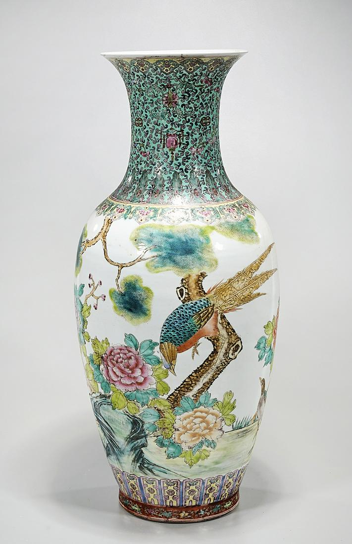 Chinese Enameled Porcelain Vase: Chinese enameled porcelain vase; famille rose; rockery, birds and flowers design, with calligraphy; 24" x 11" (approx.) Condition: wear, frits, pits, minor loss