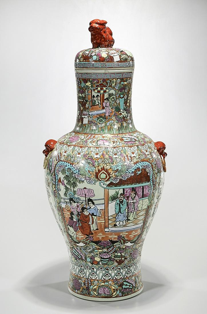 Tall Chinese Enameled Porcelain Covered Vase: Tall Chinese enameled porcelain covered vase; animal-form finial; with scenes of figures, flowers and birds; 31 1/2" x 13" (approx.) Condition: wear, frits, pits, minor loss