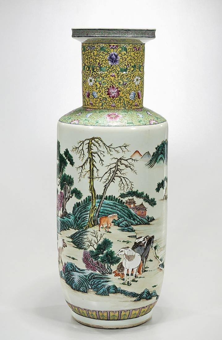 Tall Chinese Enameled Porcelain Vase: Tall Chinese enameled porcelain rouleau vase; depicting landscapes with water, figures and animals; 27 1/4" x 10 1/4" (approx.) Condition: wear, frits, pits, minor loss