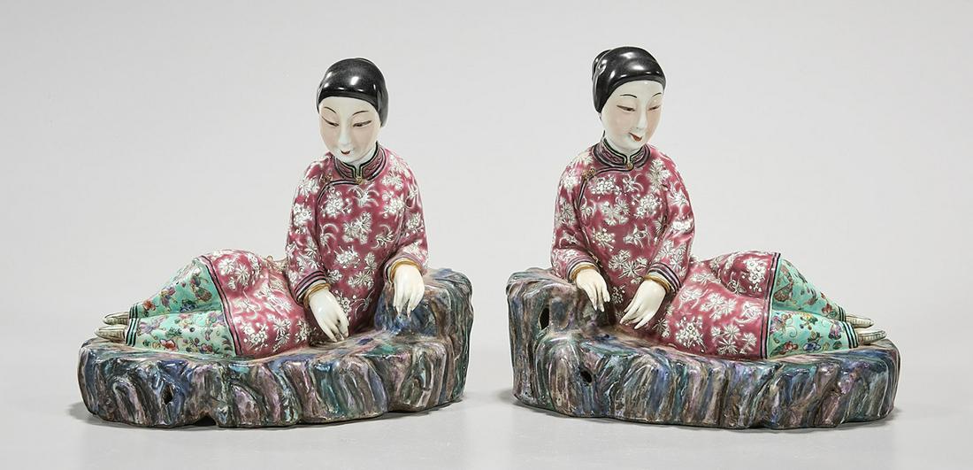 Pair Chinese Enameled Porcelain Beauties: Pair of Chinese enameled porcelain figures of beauties; 6 1/2" x 7" x 4 1/2" (each, approx.) Condition: wear, frits, pits, minor loss