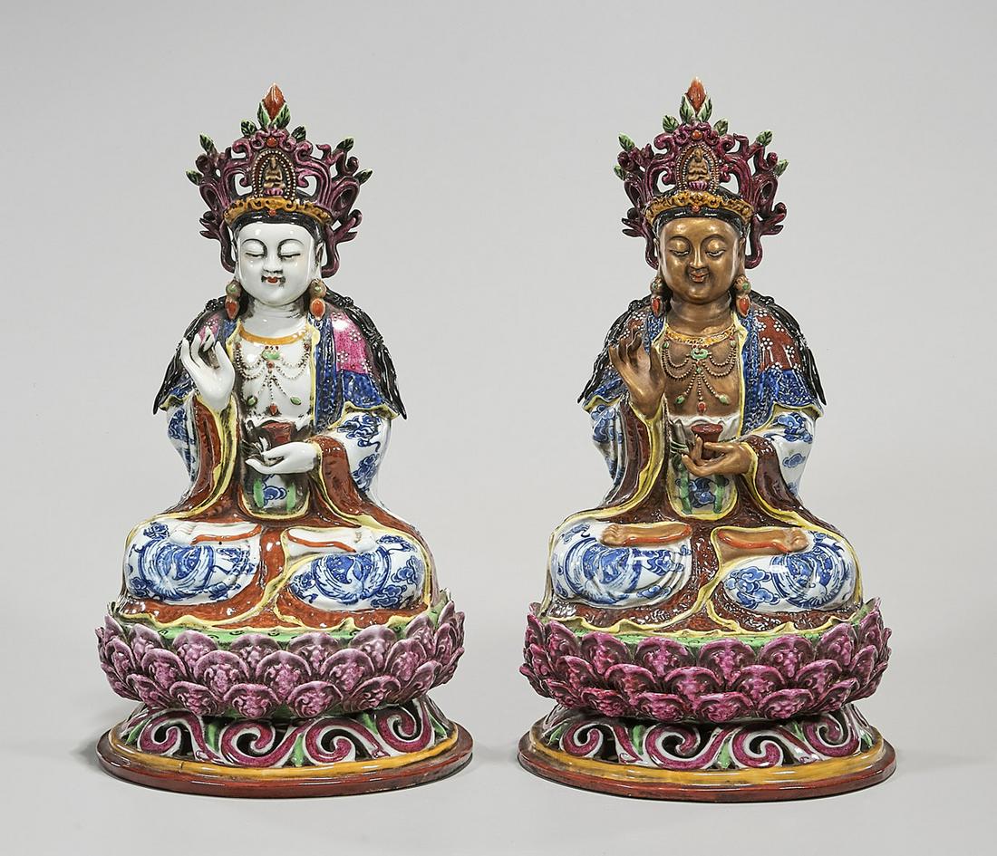 Group of Two Chinese Enameled Porcelain Buddhist: Two Chinese enameled, blue and white porcelain Buddhist figures; 14" x 8" x 6" (each, approx.) Condition; wear, frits, pits, minor loss