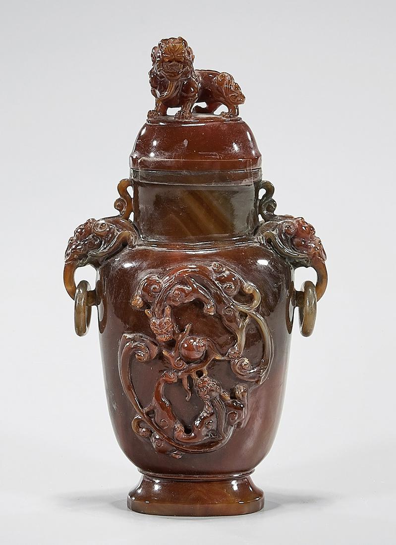 Chinese Carnelian Carved Covered Vase: Chinese carnelian covered vase; 10" x 6" x 2 1/2" (approx.) Condition: wear, surface scuffing, minor loss