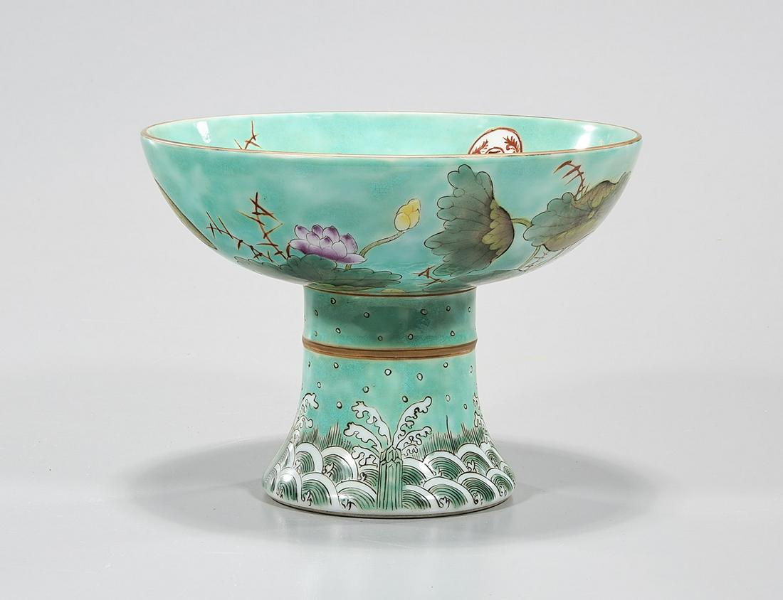 Chinese Enameled Porcelain Stem Cup: Chinese enameled turquoise glazed porcelain stem cup; birds, lotus flower design; 5" x 7" (approx.) Condition: wear, frits, pits, minor loss
