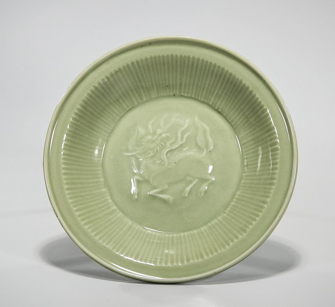 Chinese Longquan Glazed Porcelain Bowl: Chinese longquan glazed porcelain bowl; qilin motif; D: 11 1/2" (approx.) Condition: wear, frits, pits, minor loss