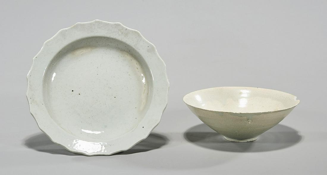 Two Chinese White Glazed Porcelains: Two Chinese white glazed porcelains; including a plate and bowl; D: 8" (larger, approx.) Condition: wear, frits, pits, losses