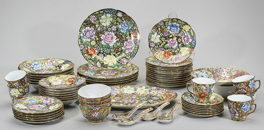 Large Set of Chinese Porcelain Dinnerware: 5 dinner plates, 12 salad plates, 5 small plates, 6 bowls, 7 dessert bowls, 7 saucers, 6 cups, 4 soup bowls, 4 soup spoons, 2 serving bowls and 1 serving platter; count of 59; D: 9 1/2" (largest, appr