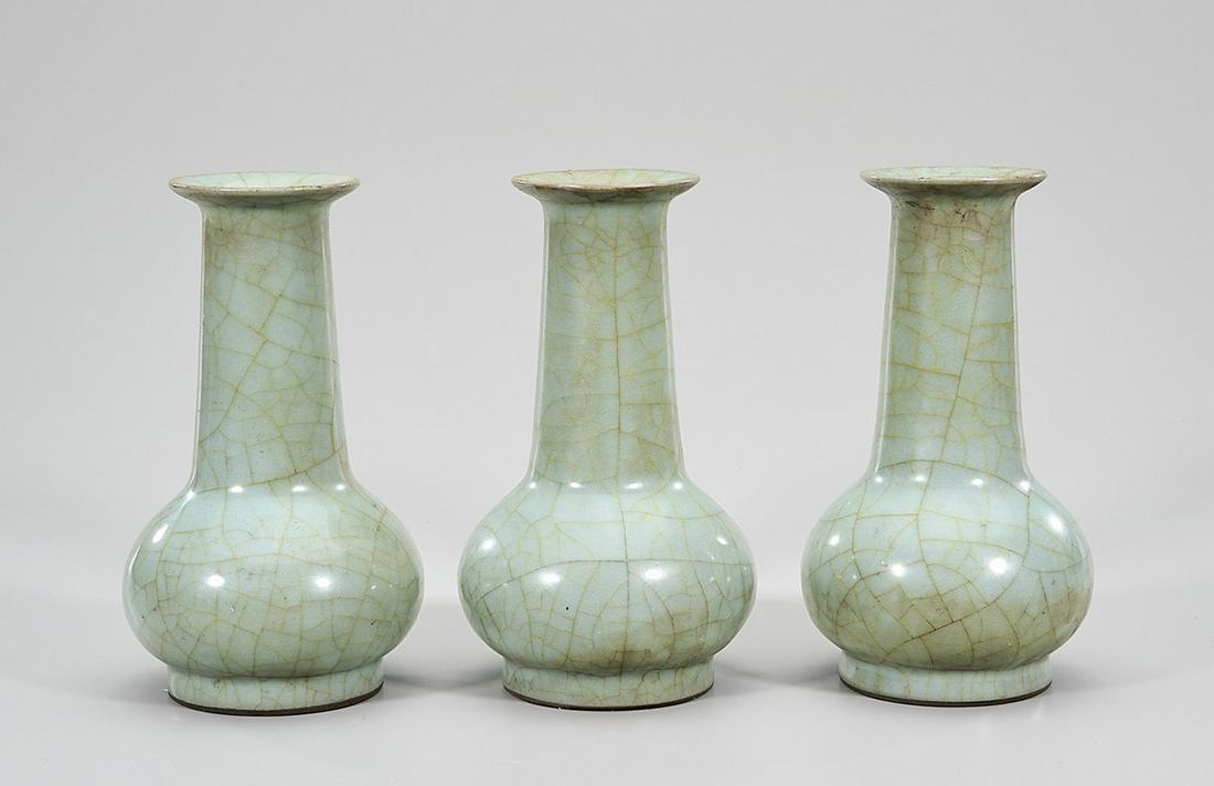 Group of Three Chinese Ru Ware Porcelain Vases: Three Chinese ru ware crackle glazed porcelain vases; 7 1/2" x 4" (each, approx.) Condition: wear, frits, pits, minor loss