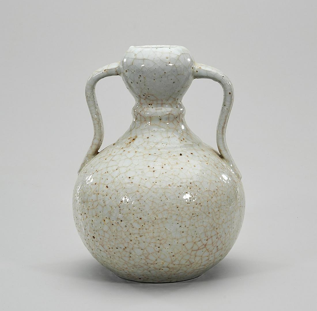 Chinese Crackle Glazed Double Handled Vase: Chinese crackle glazed double handled vase; Yongzheng mark but later; 10" x 7" (approx.) Condition: wear, frits, pits, minor loss