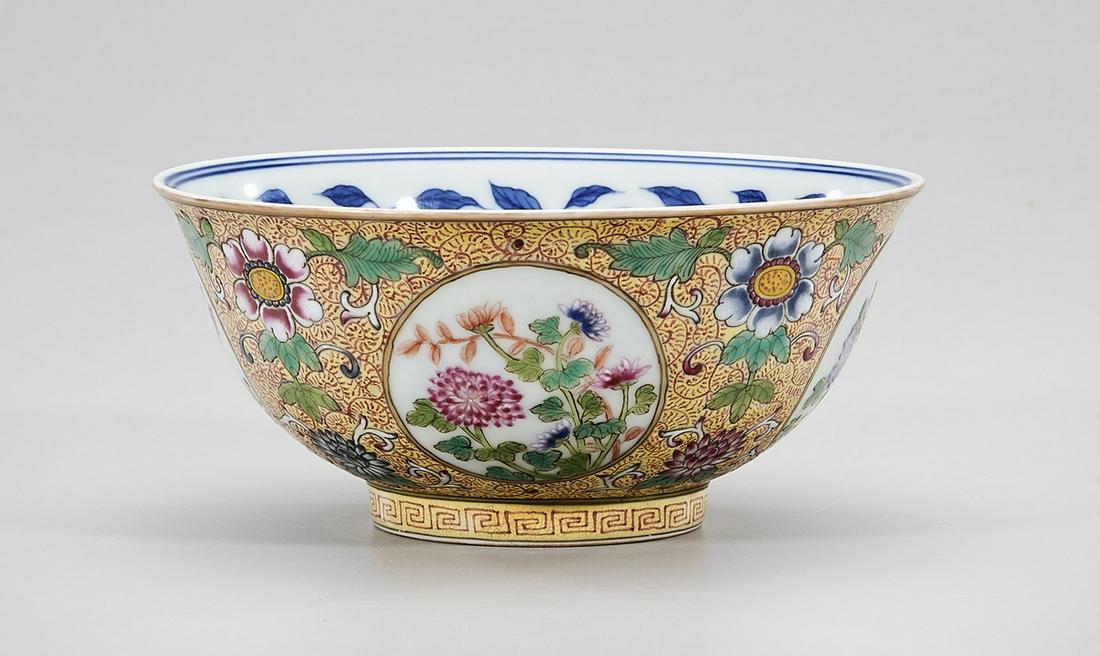 Chinese Enameled Porcelain Bowl: Chinese blue and white and enameled porcelain famille rose bowl; floral motifs; Daoguang mark to base; 2 1/2" x 6" (approx.) Condition: wear, frits, pits