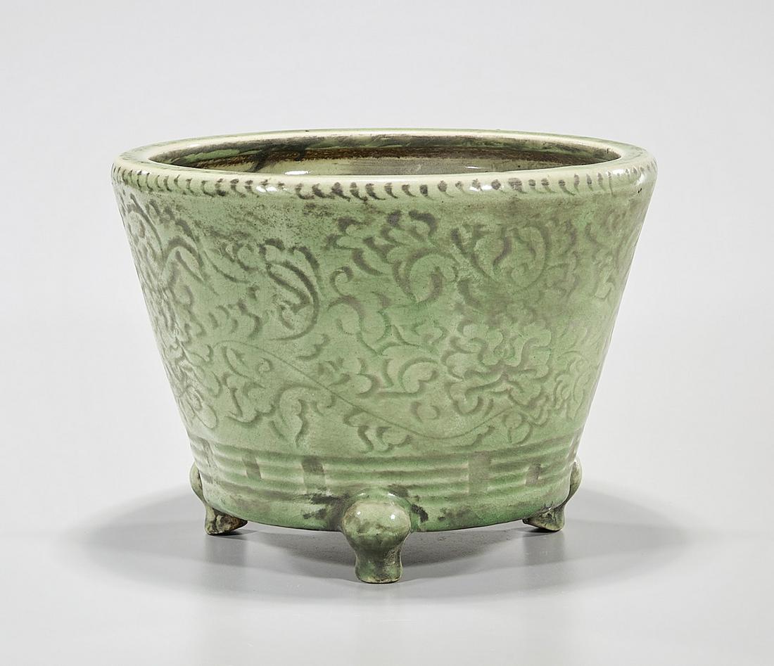 Chinese Longquan Glazed Tripod Porcelain Censer: Chinese Longquan glazed tripod porcelain censer; incised flowers; 8" x 10 1/2" (approx.) Condition: general wear, frits, pits, minor losses
