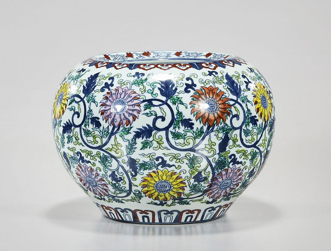 Chinese Doucai Porcelain Water Pot: Chinese doucai porcelain water pot; 7" x 9" (approx.) Condition: crack to bottom; general wear, frits, pits, minor losses