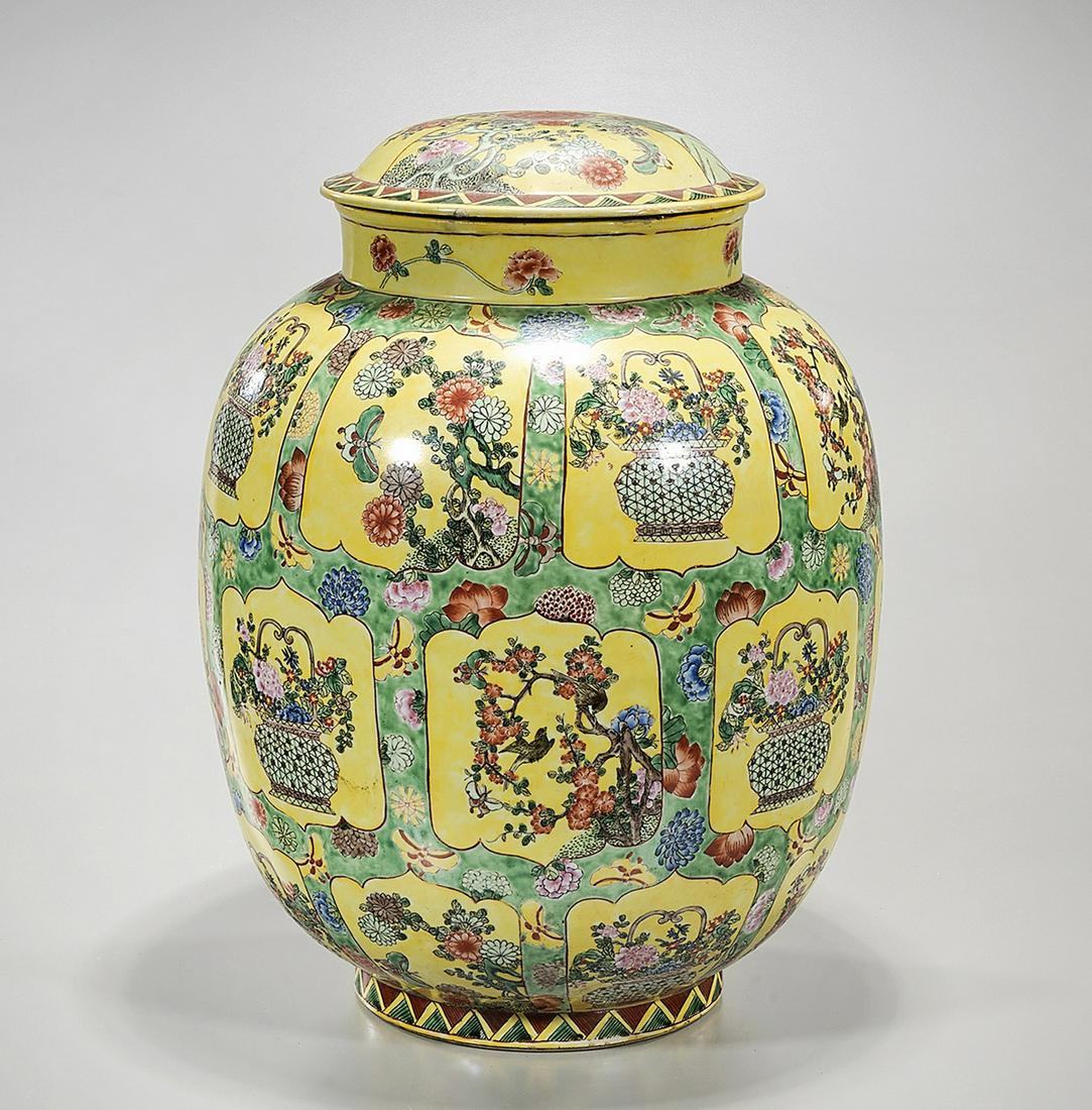 Chinese Enameled Porcelain Covered Vase: Chinese enameled porcelain covered vase; yellow ground with flower motifs; 18 1/2" x 15" (approx.) Condition: general wear, frits, pits, minor losses