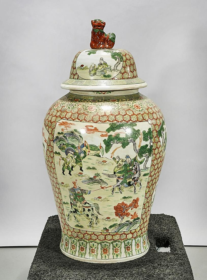Tall Chinese Enameled Porcelain Covered Vase: Tall Chinese enameled porcelain covered vase; depicting figures in landscapes; 33" x 16" (approx.) Condition: wear, frits, pits, minor loss