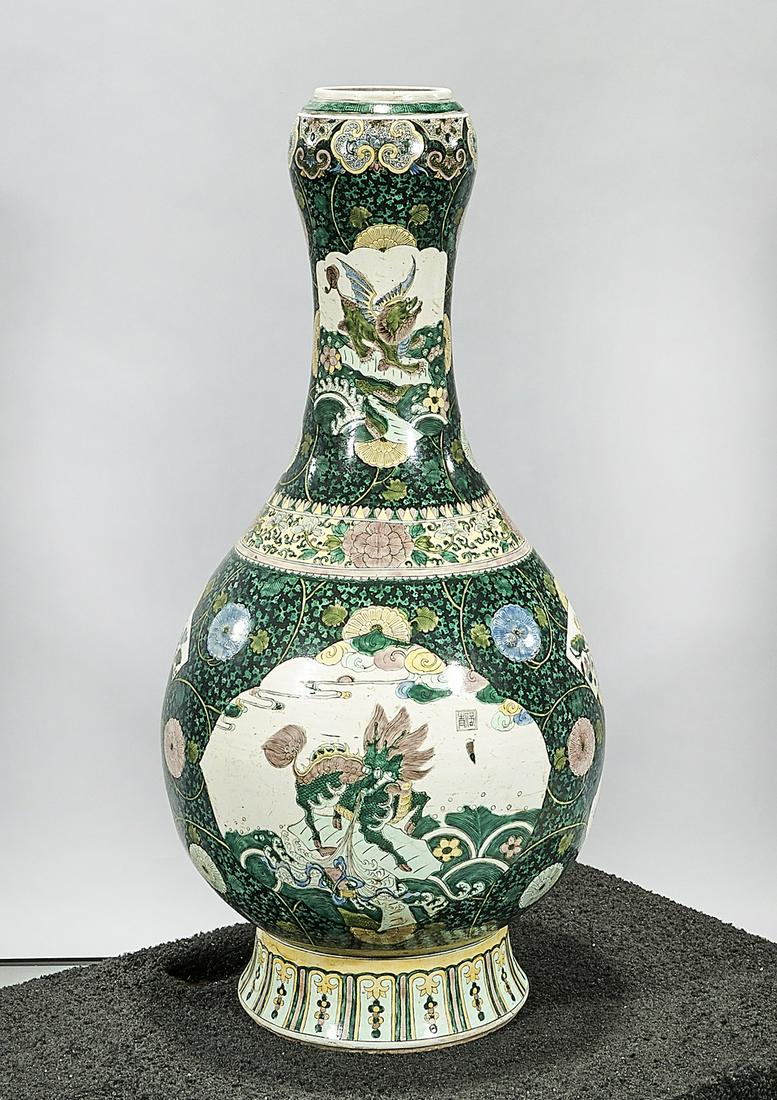 Tall Chinese Famille Verte Porcelain Vase: Tall Chinese famille verte porcelain garlic mouth vase; with qilin and floral motif; mark to base; 31" x 16" (approx.) Condition: wear, frits, pits, minor loss