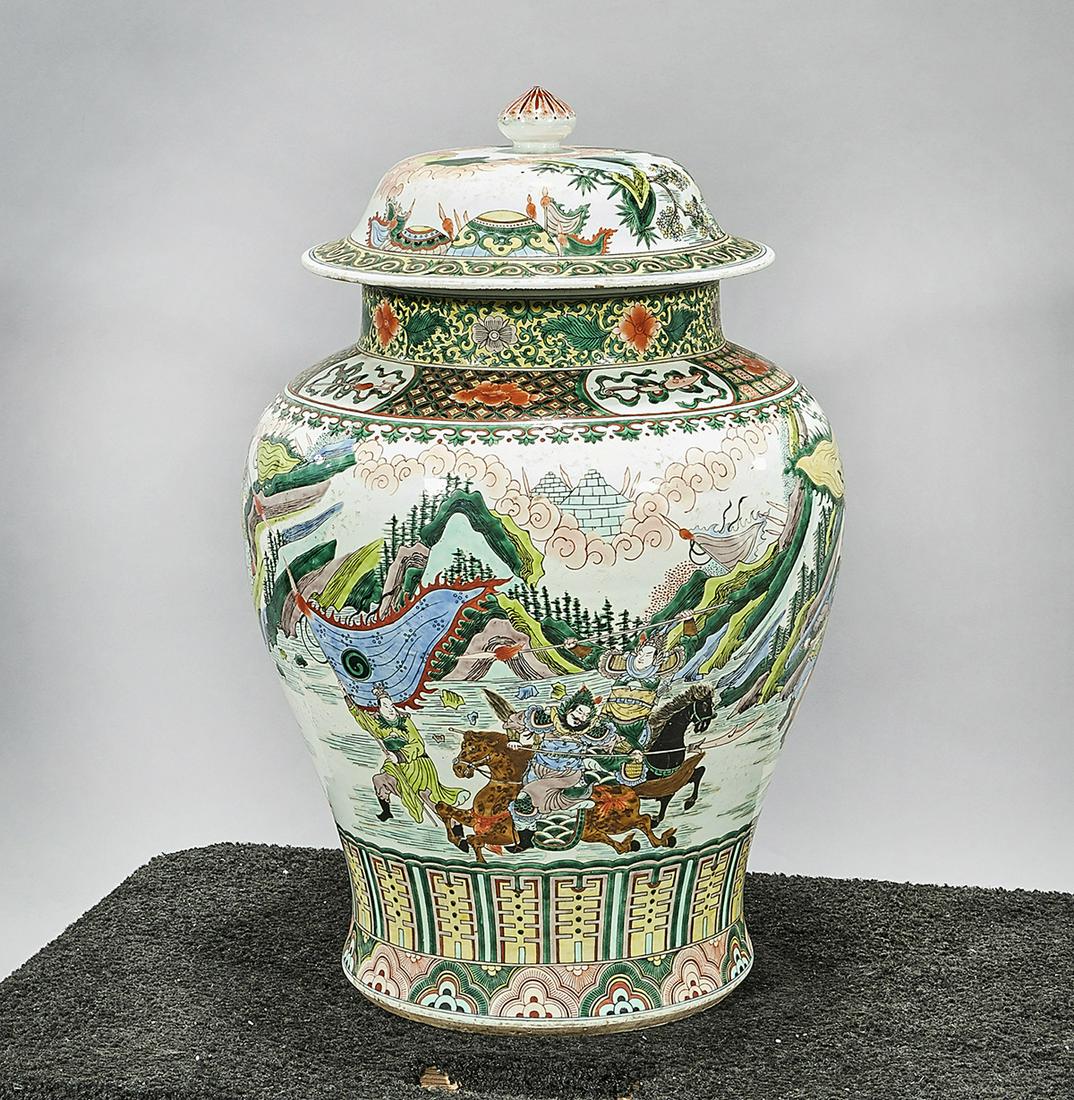 Tall Chinese Famille Verte Porcelain Covered Vase: Tall Chinese famille verte porcelain covered vase; depicting men in battle among a landscape; 25" x 18 1/2" (approx.) Condition: wear, frits, pits, minor loss