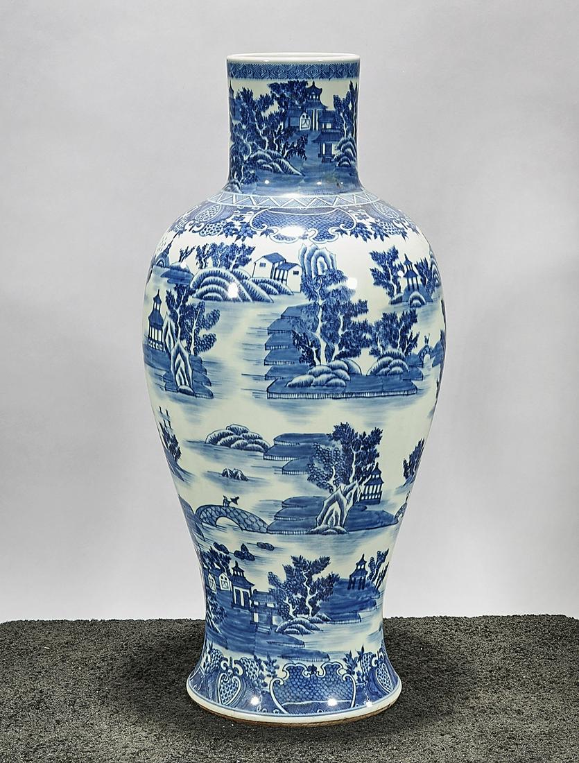 Tall Chinese Blue and White Porcelain Vase: Tall Chinese blue and white porcelain vase; depicting numerous landscape scenes; 29 1/2" x 14 1/2" (approx.) Condition: wear, frits, pits, minor loss