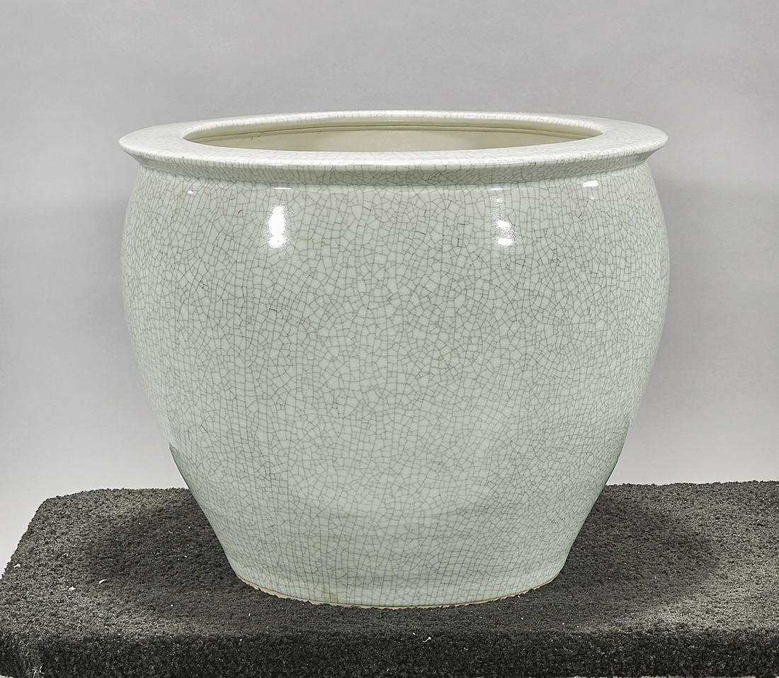 Chinese Crackle Glazed Porcelain Jardiniere: Chinese crackle glazed porcelain jardiniere; 16" x 19 1/2" (approx.) Condition: wear, frits, pits, minor loss