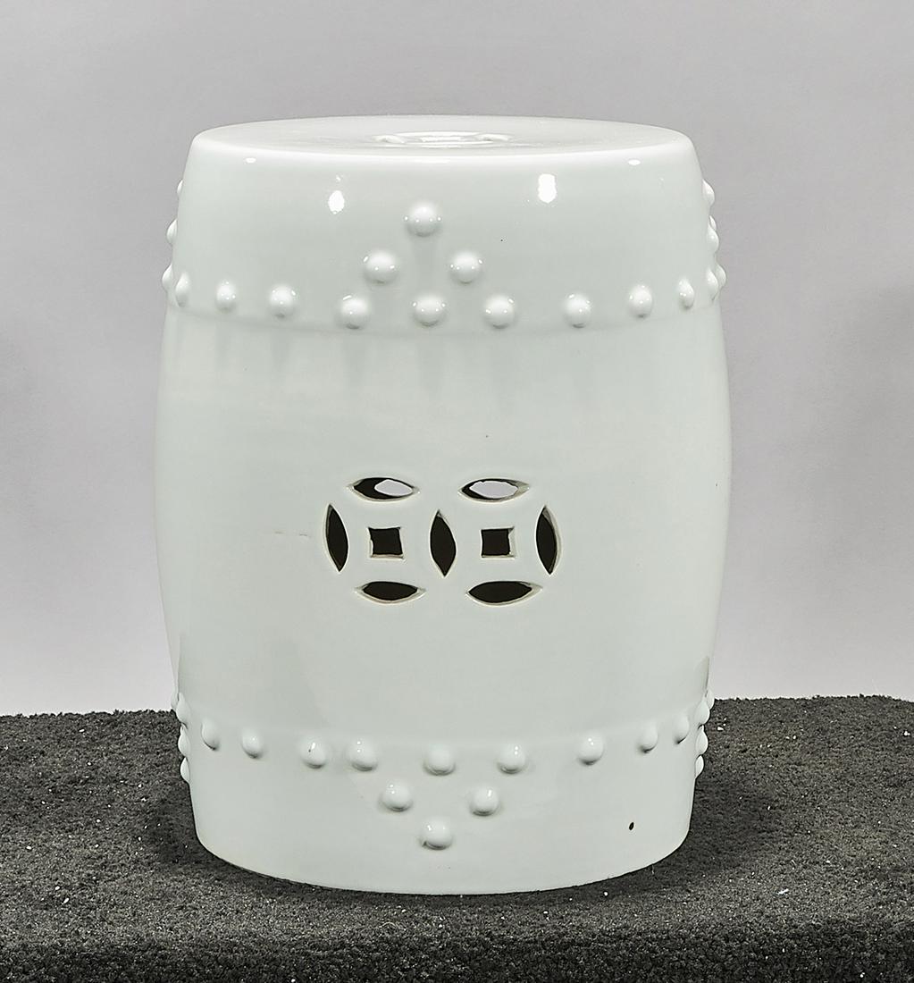 Chinese White Glazed Porcelain Garden Seat: Chinese white glazed porcelain garden seat; double coins and beaded design; 16 1/2" x 12" (approx.) Condition: wear, frits, pits, minor loss