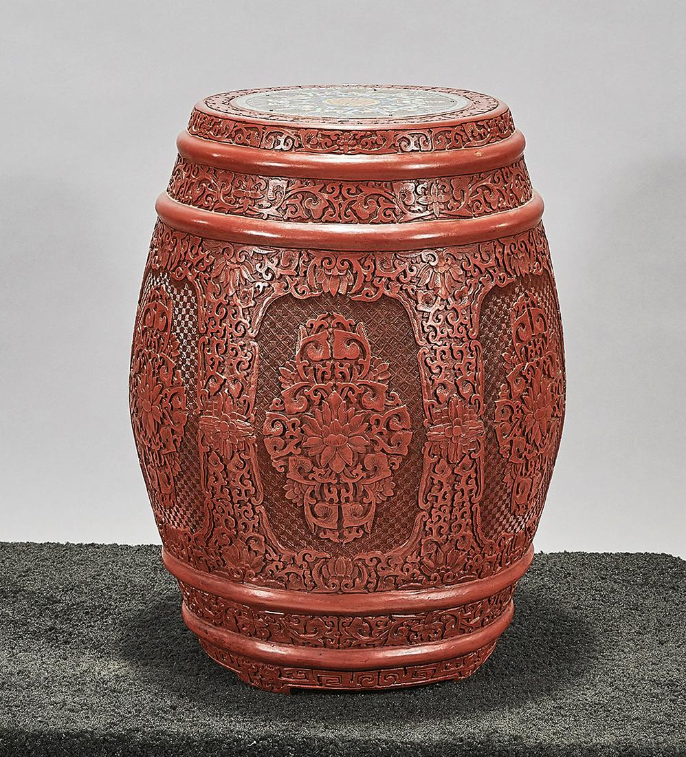 Chinese Cinnabar-Like Garden Seat: Chinese cinnabar-like garden seat; with decorated shou character designed top; 19 1/2" x 14 1/2" (approx.) Condition: wear, surface scuffing, minor loss