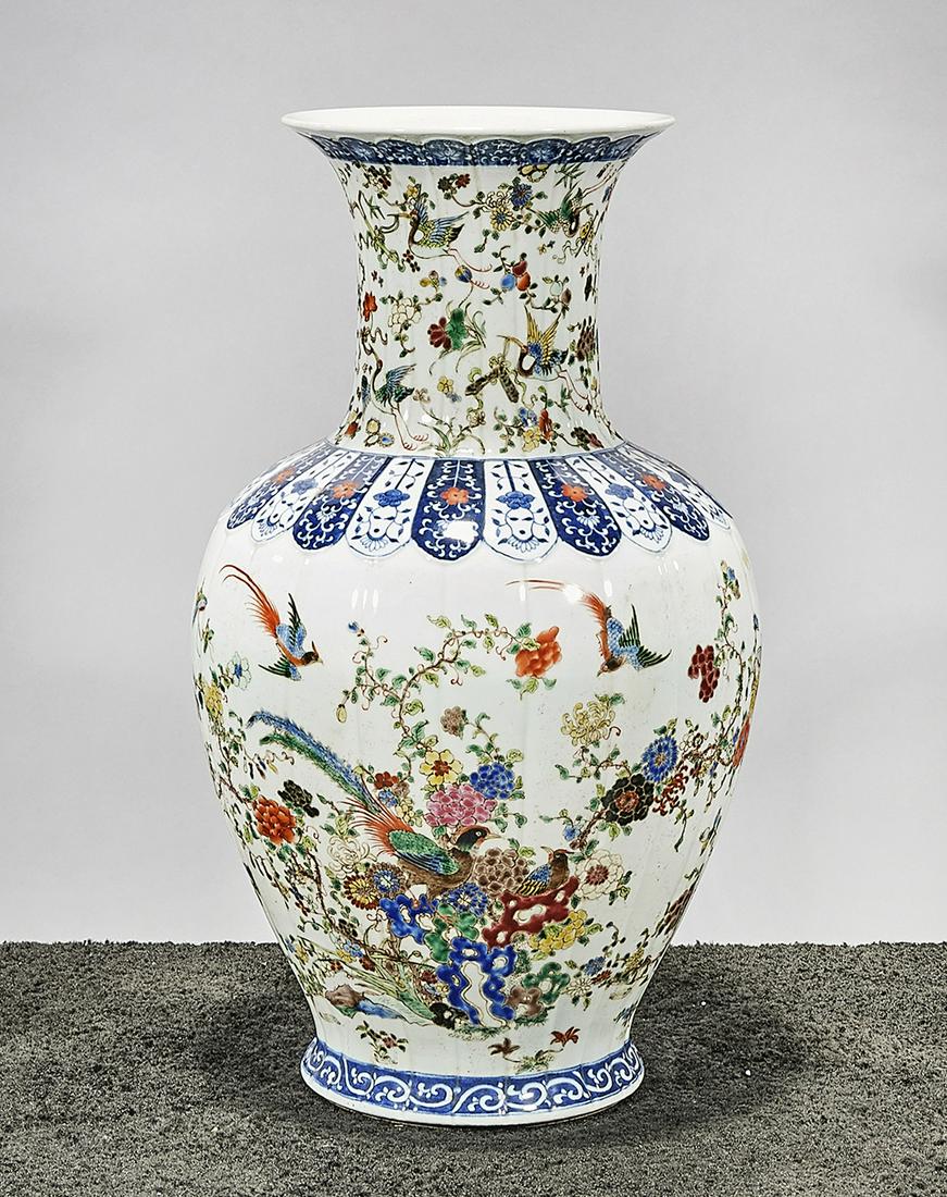 Chinese Enameled Porcelain Vase: Chinese enameled porcelain vase; fluted design with flower and bird decoration; mark; 21 1/2" x 13" (approx.) Condition: wear, frits, pits, minor loss