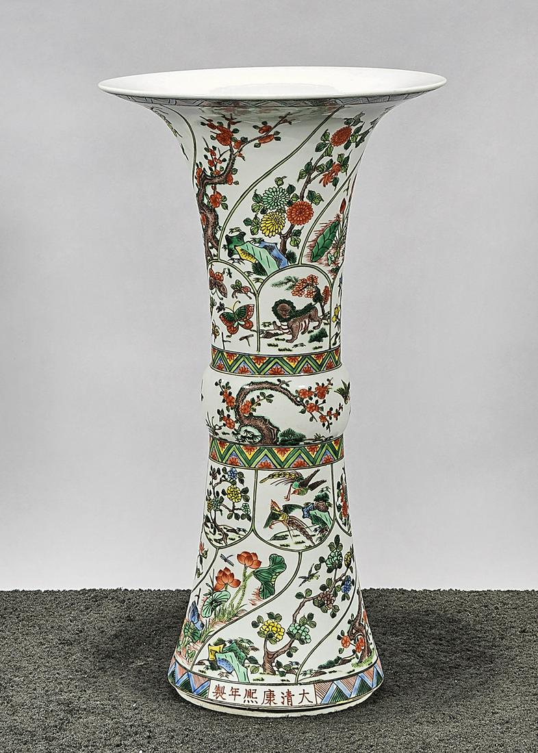 Chinese Enameled Porcelain Gu-Form Vase: Chinese enameled porcelain gu-form vase; with flowers and birds motif; mark; 21" x 11 1/2" (approx.) Condition: wear, frits, pits, minor loss