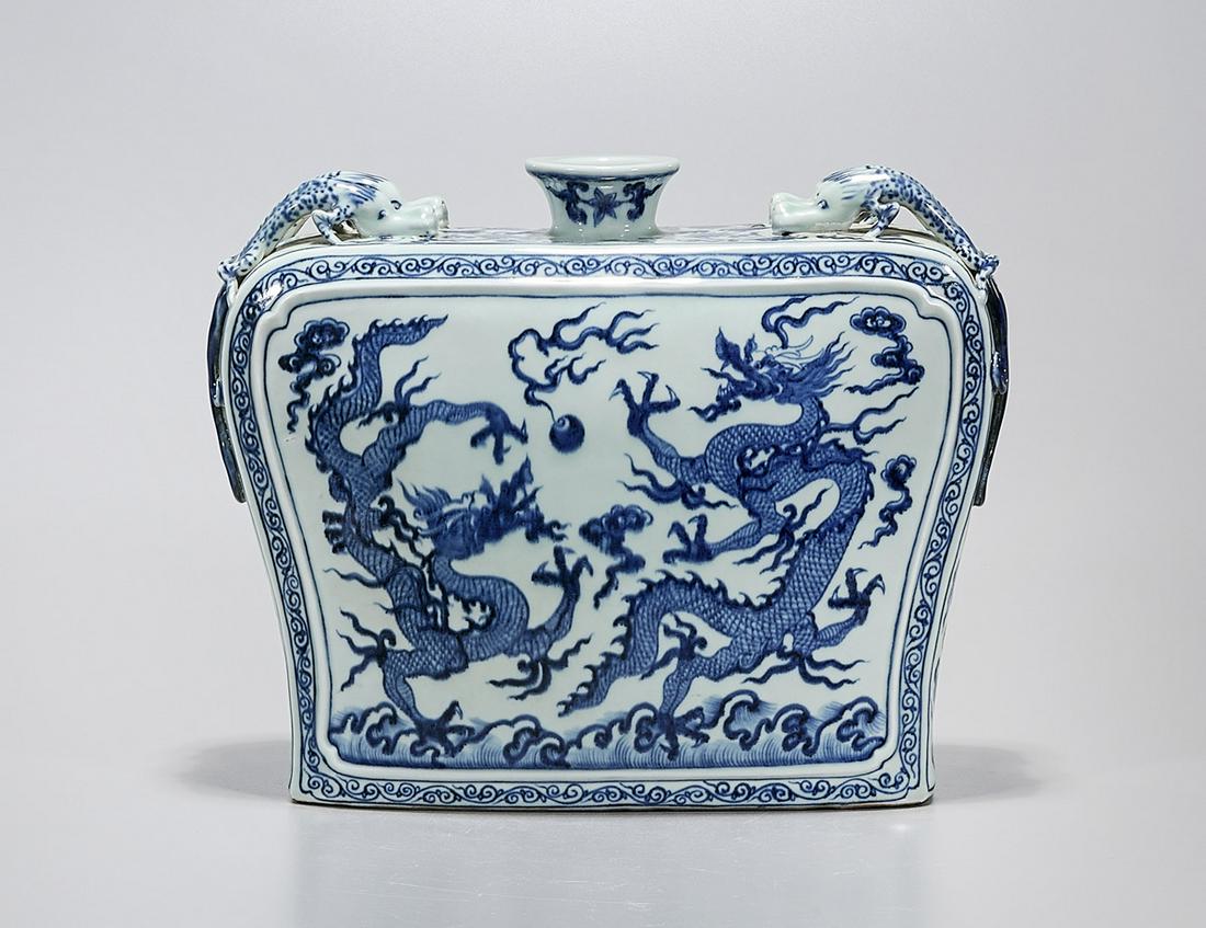 Chinese Blue and White Porcelain Flat Vase: Chinese blue and white porcelain flat vase; dragons chasing pearls motif; chilong molds to shoulders; 11" x 13" x 5 1/2" (approx.) Condition: wear, frits, pits, minor loss