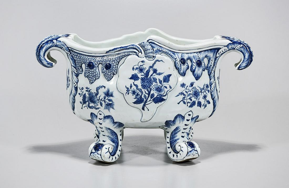 Chinese Blue and White Porcelain Footed Planter: Chinese blue and white porcelain footed planter; with floral decoration; mark to base; 10" x 17 1/2" x 9 1/2" (approx.) Condition: wear, frits, pits, minor loss