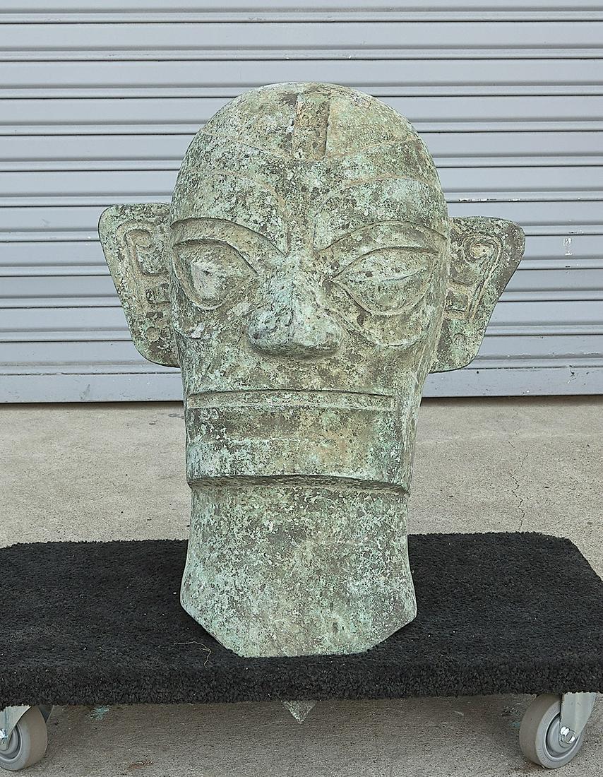 Chinese Han-Style Bronze Head: Chinese Han-style bronze head; 25" x 23" x 16" (approx.) Condition: wear, losses