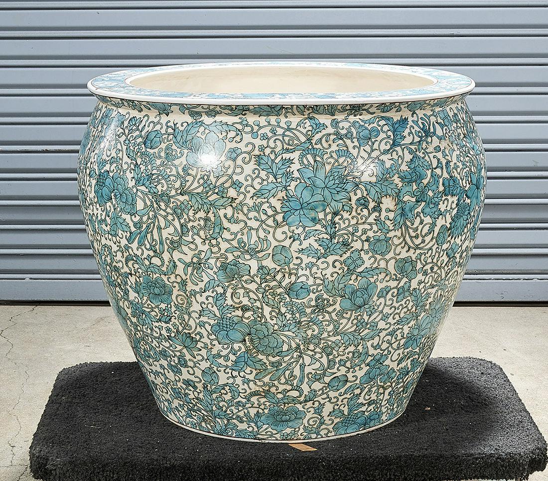 Chinese Enameled Porcelain Fish Bowl: Chinese enameled porcelain fish bowl; all-over floral design; 22" x 28" (approx.) Condition: wear, minor losses
