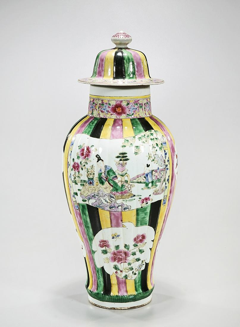 Chinese Enameled Porcelain Covered Vase: Chinese enameled porcelain covered vase; figural motifs; 22" x 8" (approx.) Condition: general wear, frits, pits, minor losses