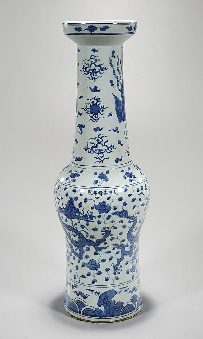 Chinese Blue and White Porcelain Vase: Chinese blue and white porcelain vase; dragons chasing pearls; Jiajing mark; 25" x 10" (approx.) Condition: wear, frits, pits, minor loss