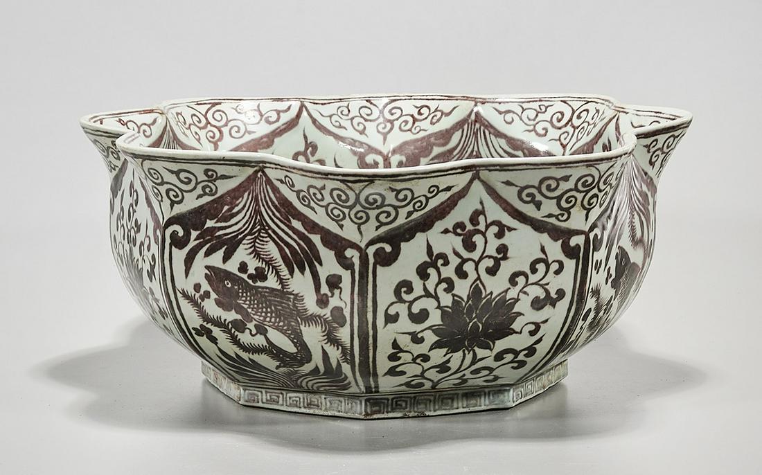 Chinese Red and White Porcelain Basin: Chinese red and white porcelain petal mouth form basin; with bird, fish and flower motifs; 7" x 17" (approx.) Condition: wear, frits, pits, minor loss