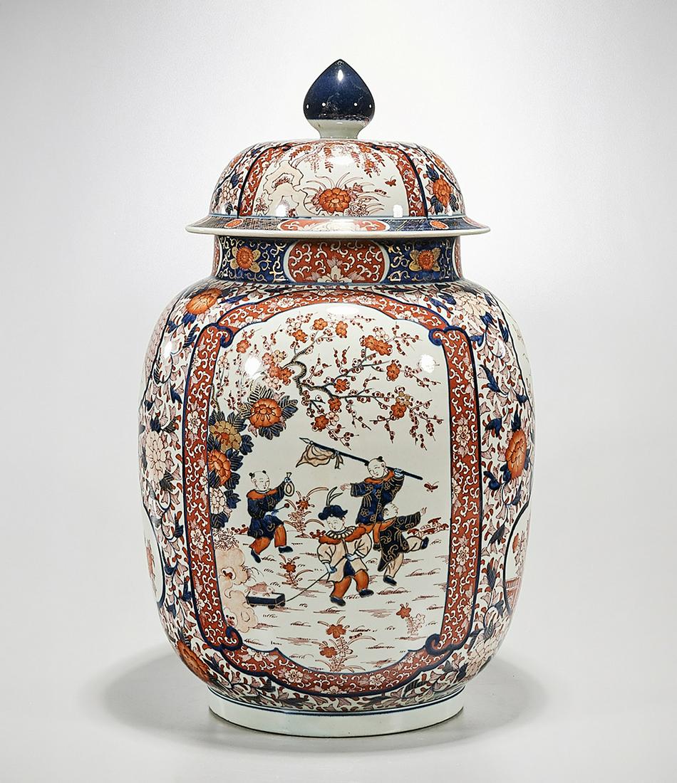 Japanese Red, Blue and White Porcelain Covered Jar: Japanese red, blue and white covered porcelain jar; 22" x 13" (approx.) Condition: wear, frits, pits, minor loss
