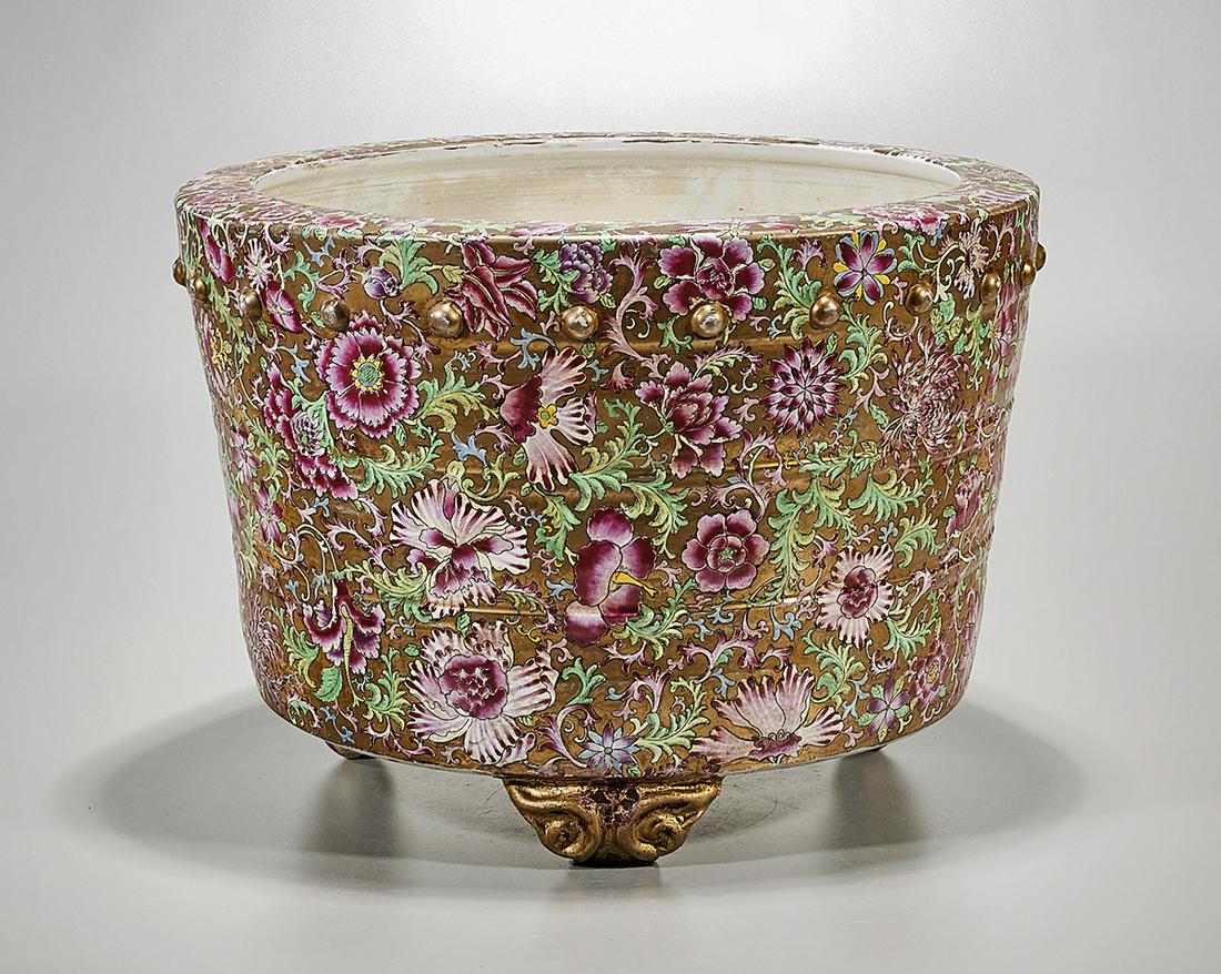 Chinese Enameled Porcelain Jardiniere: Chinese enameled porcelain tripod jardiniere; all-over floral design; 13" x 17" (approx.) Condition: wear, frits, pits, minor loss