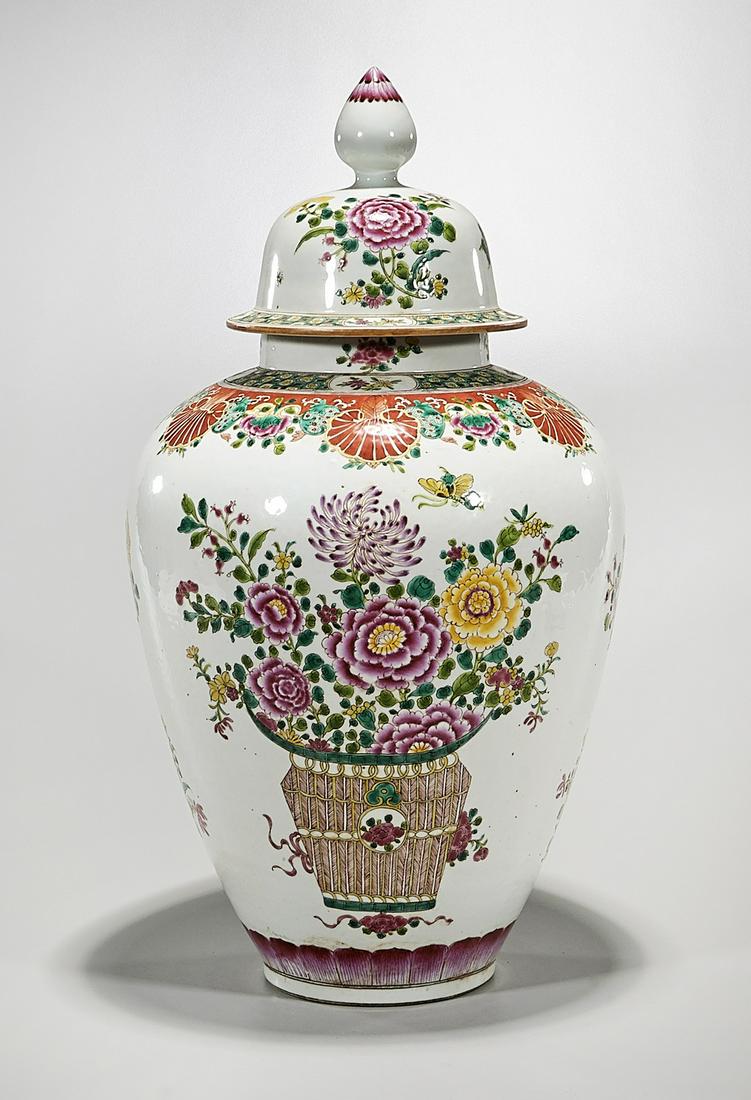 Chinese Enameled Porcelain Covered Vase: Chinese enameled porcelain covered vase; with floral motifs; 22" x 12 1/2" (approx.) Condition: wear, frits, pits, minor loss